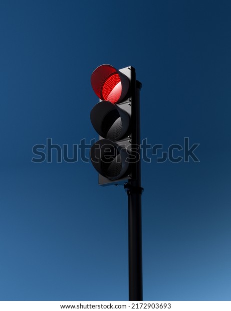 traffic light with\
working red signal isolated on blue sky background. Stop signals.\
Mock-up or source. 3d\
render