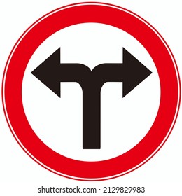 A traffic sign that means : turn left or turn right. Left Turn Or Right Turn