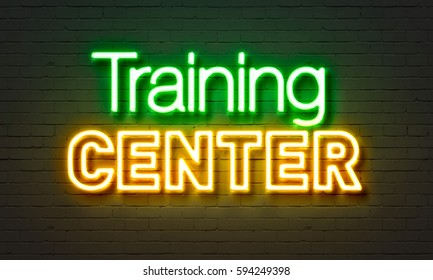 Training Center Neon Sign On Brick Wall Background