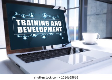 Training and Development text on modern laptop screen in office environment. 3D render illustration business text concept.