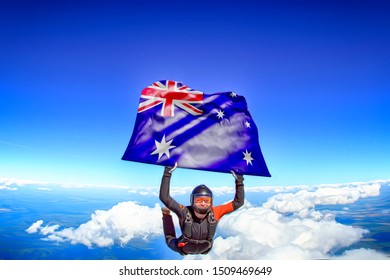 Travel Australia. Man Takes Australian Flag  In Air.  Skydiving Australia 