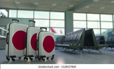 Travel suitcases featuring flag of Japan. Japanese tourism conceptual 3D rendering