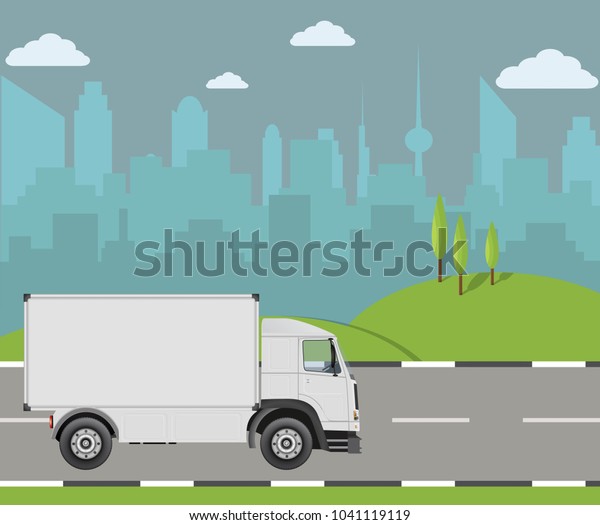 Truck driving\
on the road. Cargo\
transportation