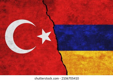 Turkey and Armenia painted flags on a wall with a crack. Turkey and Armenia conflict