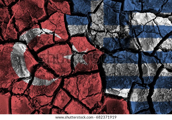 Turkey and Greece flag on cracked ground . Confliction\
and crisis concept\
.