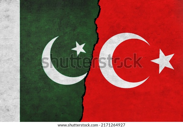 Turkey and Pakistan painted flags on a wall with\
a crack. Pakistan and Turkey relations.Turkey and Pakistan flags\
together