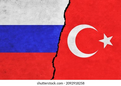 Turkey and Russia painted flags on a wall with a crack. Russia and Turkey relations. Russia and Turkey flags together. Turkey vs Russia