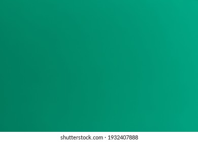 Turquoise dark uniform background in large format