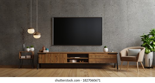 Tv on cabinet the in modern living room the concrete wall,3d rendering