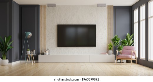 TV On Cabinet In Modern Living Room With Armchair,lamp,table,flower And Plant On Plaster Wall Background,3d Rendering