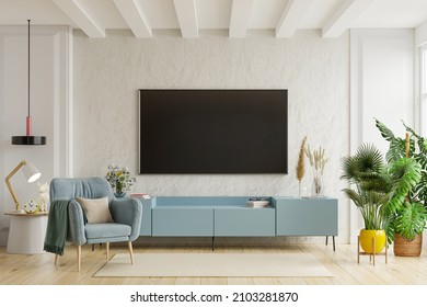 TV On The Cabinet In Modern Living Room With Armchair On Plaster Wall Background,3d Rendering