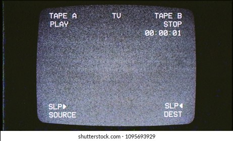 A Tv Screen Showing Noise From An Old VHS Tape Tracking A Bad Signal. Double Deck Layout. Cool Retro Vintage Background.
