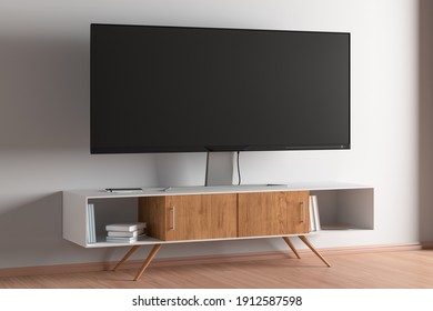 TV Wide Screen On The TV Stand In Modern Living Room With White Wall. Side View. 3d Illustration