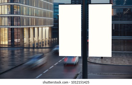 Two Blank Signs On The Post At City Night 3d Rendering