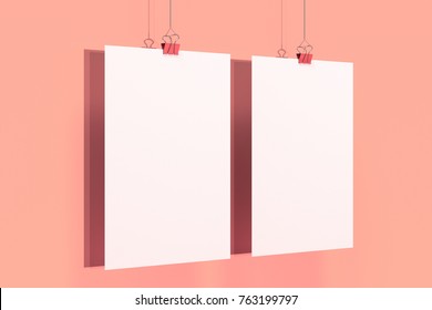 Two Blank White Posters With Binder Clip Mockup On Red Background. Poster Or Paper Sheet Template. 3D Rendering Illustration