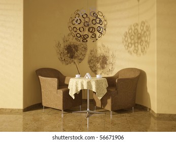 Two Brown Armchairs And Coffe Table In A Room