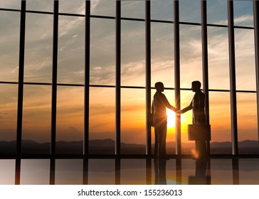 Two business  shake hand  silhouettes rendered with computer graphic 3d