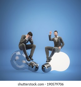 Two Businessman Sitting On Light Bulbs. Concept Idea