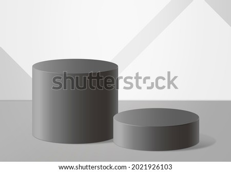 Two cylindrical podiums. Background to accommodate your design. Black and white image. 3 D visualization