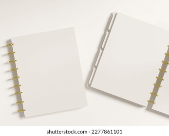 Two discbound planners as mockups, one cover and one open page. Blank space for design presentation and copy. Top view flatlay as a realistic 3d rendering.