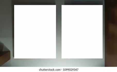 Two Empty Frames On The Blue Wall.Blank Advertisement Banner Poster Mock Up Isolated Template Clipping Path