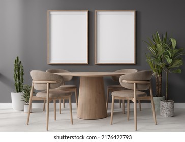 Two empty vertical picture frames on gray wall in modern dining room. Mock up interior in contemporary, scandinavian style. Free space for picture, poster. Wooden table, chairs, plants. 3D rendering
