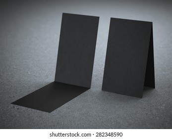 Two Folded Black Business Cards