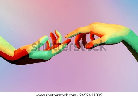 Two hands reaching upward into colorful light against a blurred background.
