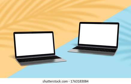 two laptops with yellow and blue background psd mockup