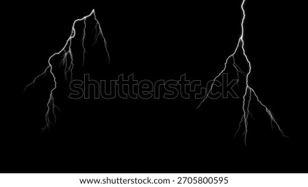 two lightning strikes are isolated on a black background showing the power and beauty of nature's electricity