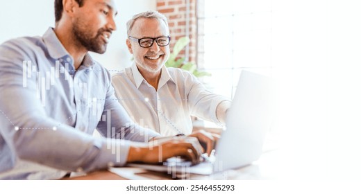 Two men working together on a laptop, smiling men in a bright office setting, Two men planning, collaborating on a project, teamwork in action. Business teamwork, collaboration concept with copy space - Powered by Shutterstock