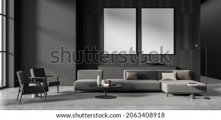 Two mockup canvases in modern dark grey living room interior with tone on tone design, on trend details, L sofa and concrete floor. Minimalist concept. 3d rendering Photo stock © 