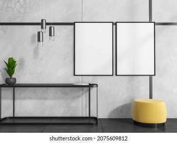 Two mockup canvases and pendant lights over frame sideboard unit with yellow padded stool in black and white living room. Wall and floor tiles. Concept of modern interior design. 3d rendering