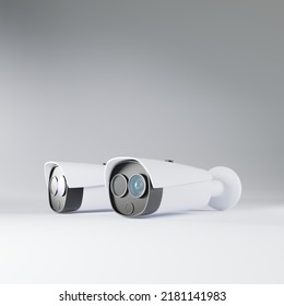 Two Optical Video Surveillance Cameras Lie Side By Side. Digital Cameras With Thermal Sensor. CCTV. 3d Rendering.