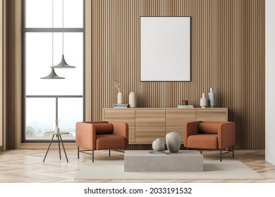 Two Orange Armchairs And A Poster For The Modern Living Room Interior Design, Using Wood Wall Panelling. A Sideboard, Pendant Lamps, Coffee Tables, A Window And Parquet. Mockup. 3d Rendering