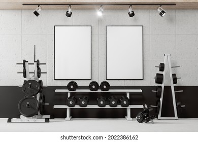 Two Posters On The Wall In The Gym Mockup. 3D Rendering