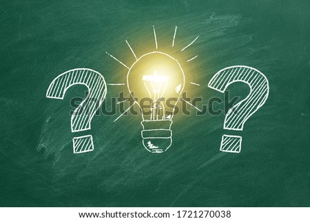 Two question marks turns into a light bulbs. Chalk drawing on a blackboard. 2d illustration