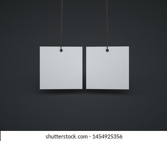 Two sided white square labels with rope, dark background. 3D Render.