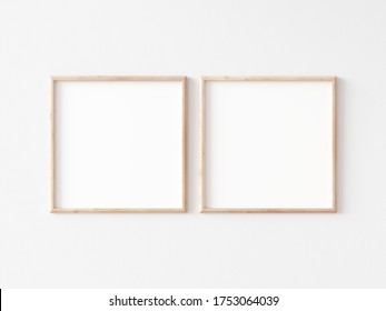 Two Square Thin Wooden Frame Mockup On White Wall. 3d Illustration.