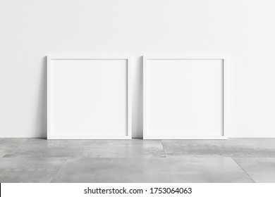 Two Square White Frame Mock Up On Concrete Floor. Blank Two White Frame. 3d Illustrations.