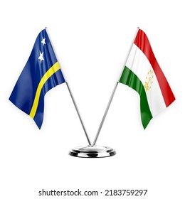 Two table flags isolated on white background 3d illustration, curacao and tajikistan