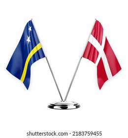Two table flags isolated on white background 3d illustration, curacao and denmark