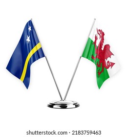 Two table flags isolated on white background 3d illustration, curacao and wales