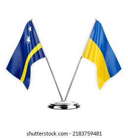 Two table flags isolated on white background 3d illustration, curacao and ukraine