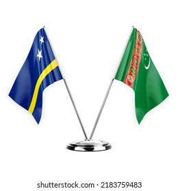 Two table flags isolated on white background 3d illustration, curacao and turkmenistan