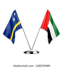 Two table flags isolated on white background 3d illustration, curacao and united arab emirates