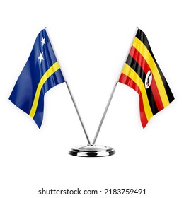 Two table flags isolated on white background 3d illustration, curacao and uganda