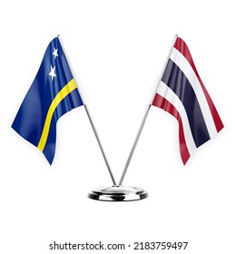 Two table flags isolated on white background 3d illustration, curacao and thailand