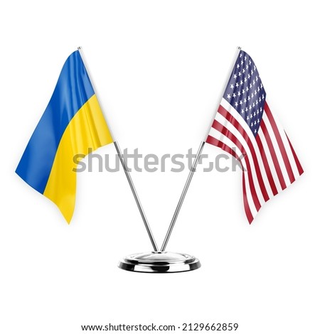 Two table flags isolated on white background 3d illustration, ukraine and usa