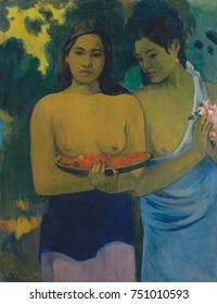 Two Tahitian Women, by Paul Gauguin, 1899, French Post-Impressionist painting, oil on canvas. This work features the beauty of the Tahitian women, painted with sculpturally modeled forms with subtle g